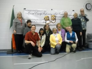 MCPAC members underneath our banner and the Irish flag